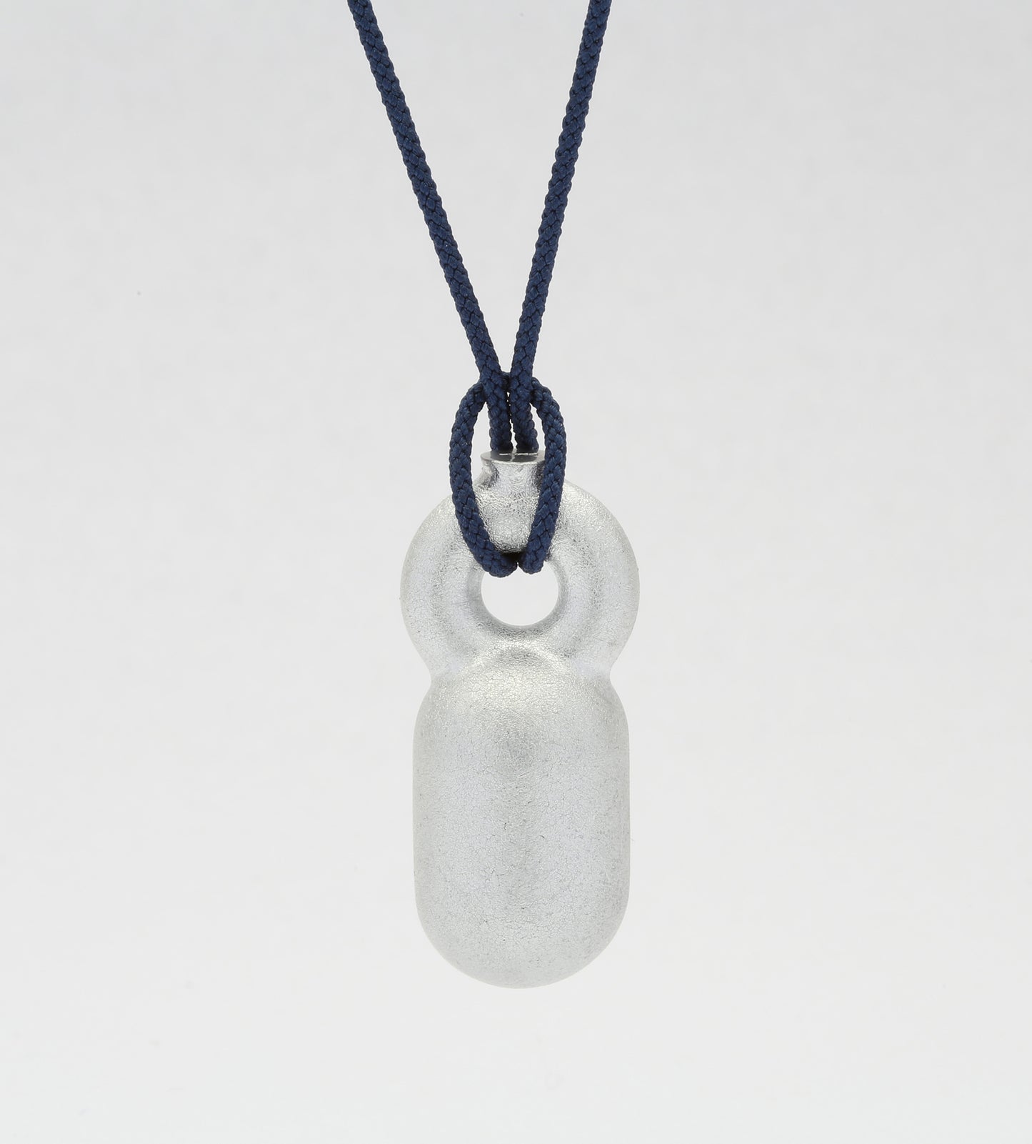 'Crossing Borders' pendants