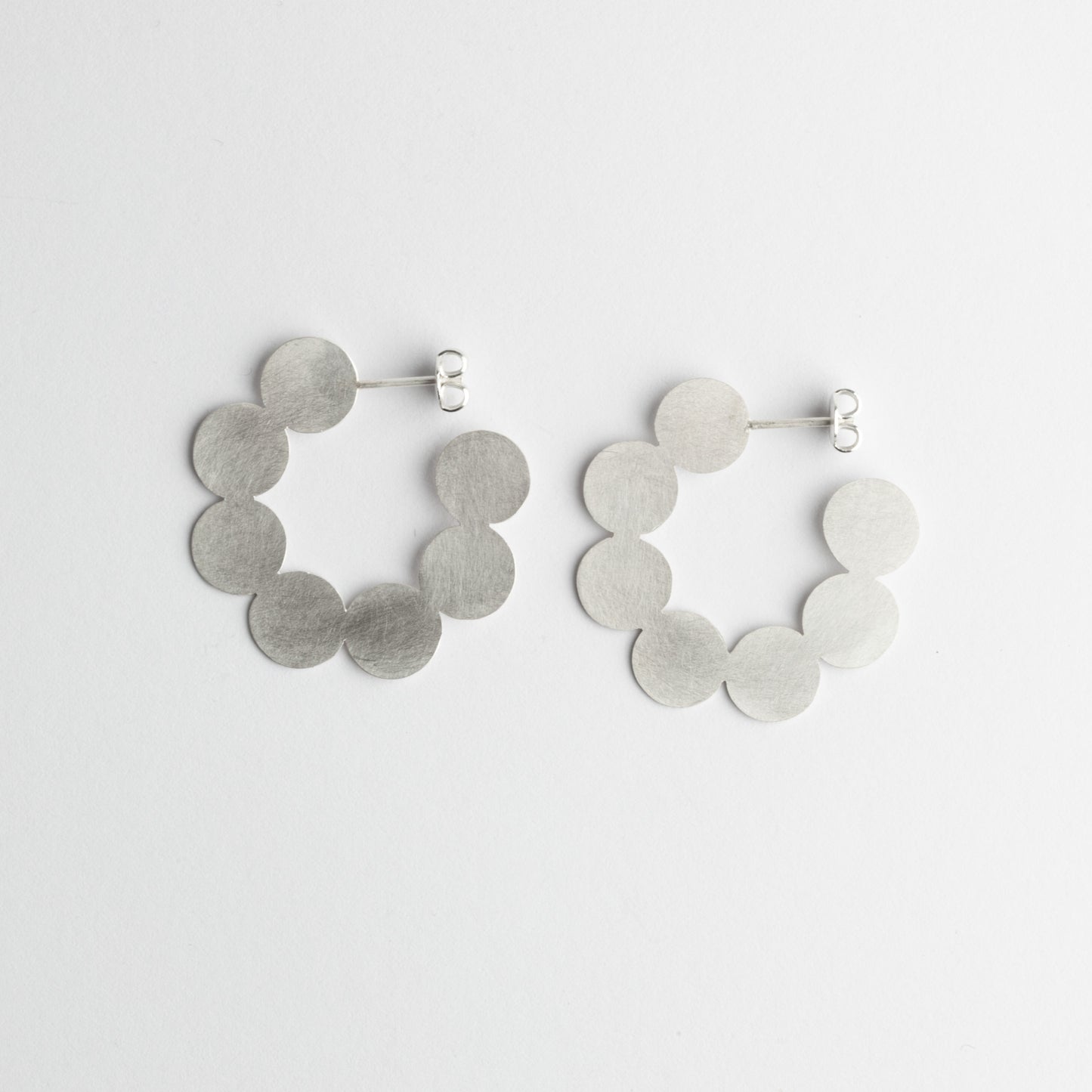 '7 point' earrings