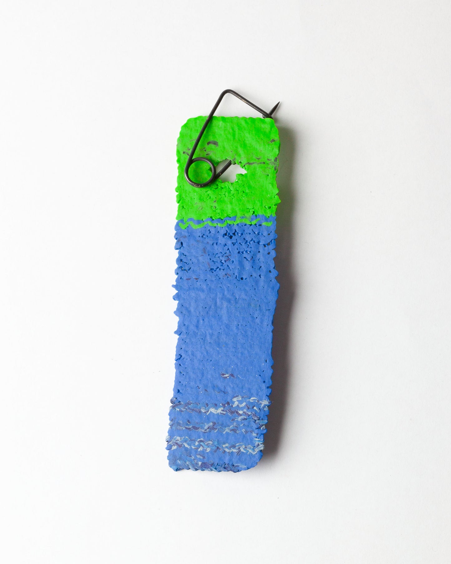 Label brooch #49