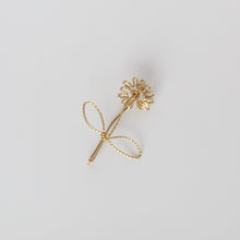 'Peed Flower' brooch