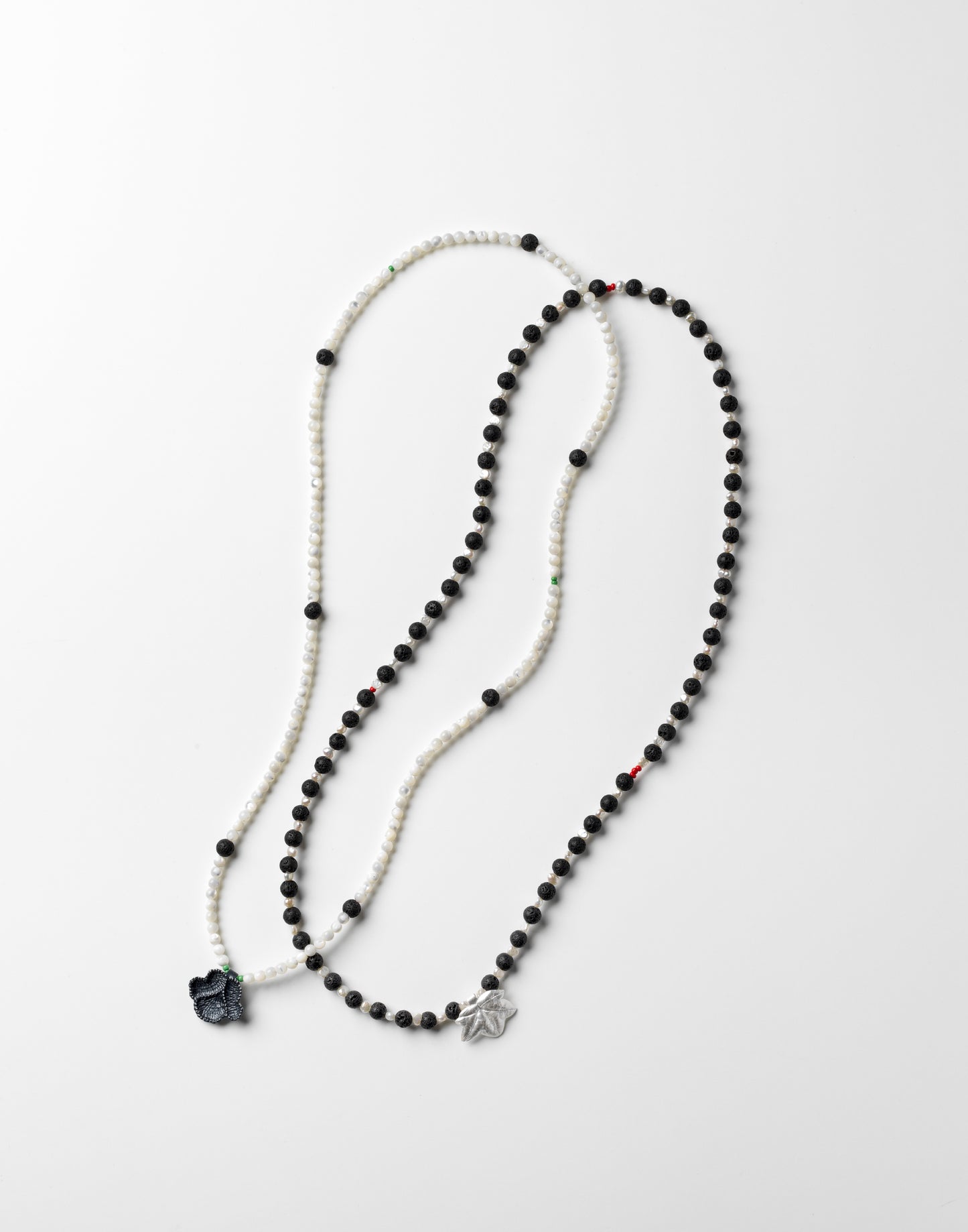 'Lotus Flower' strand of beads (left)