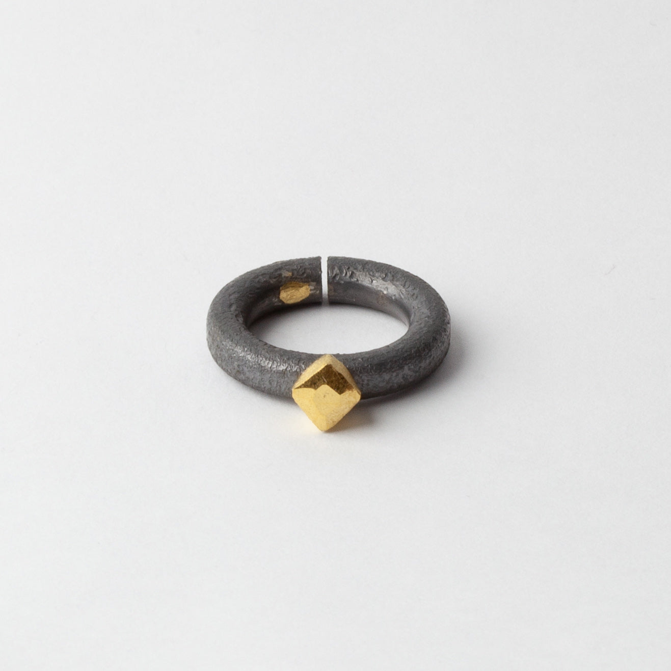 Titanium ring with gold