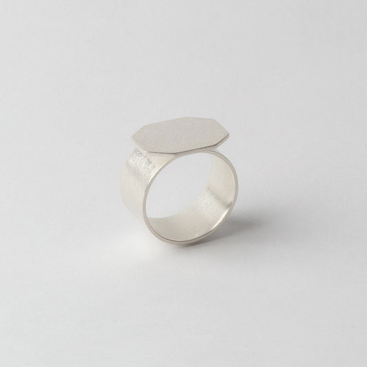 Silver textured ring (faceted front)