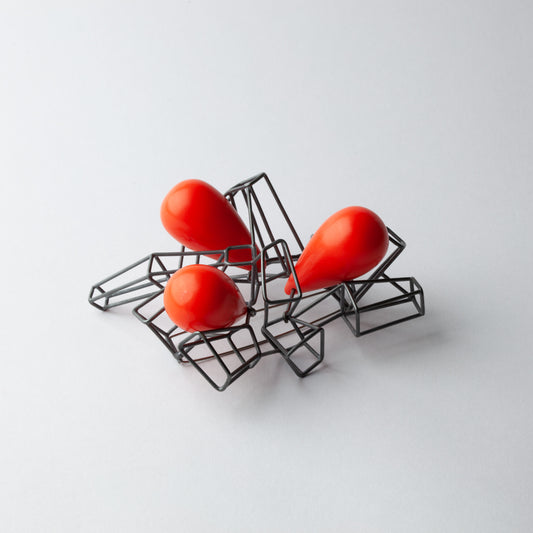 Brooch with red beads