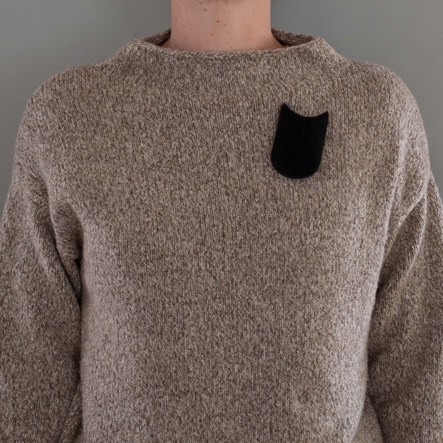 'My brooch is your tie' brooch