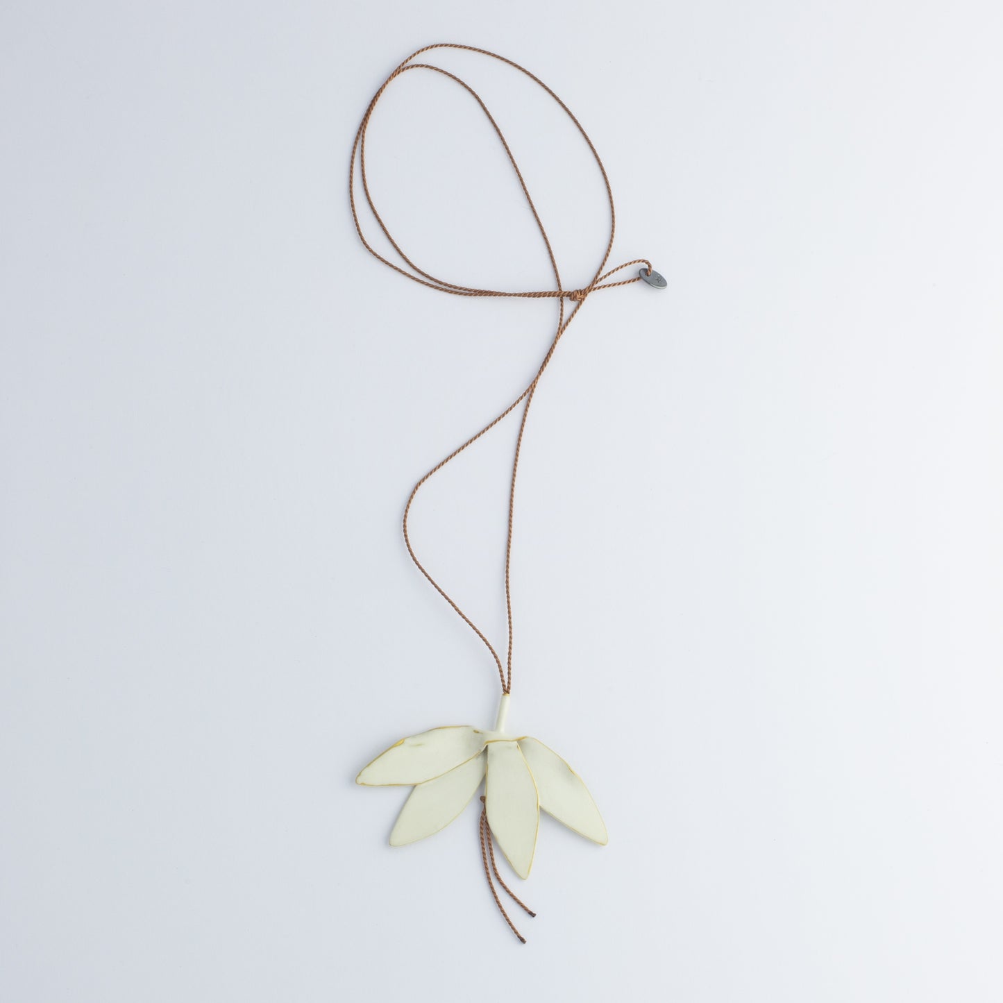 'Offerings: Wilted Champee' pendants - ivory