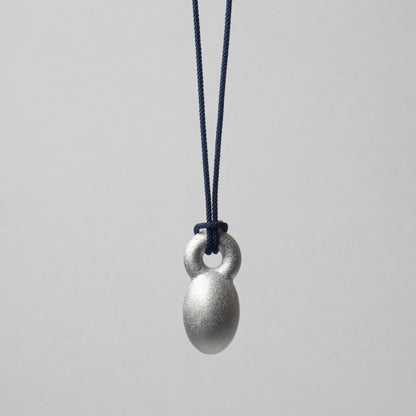 'Crossing Borders' pendant