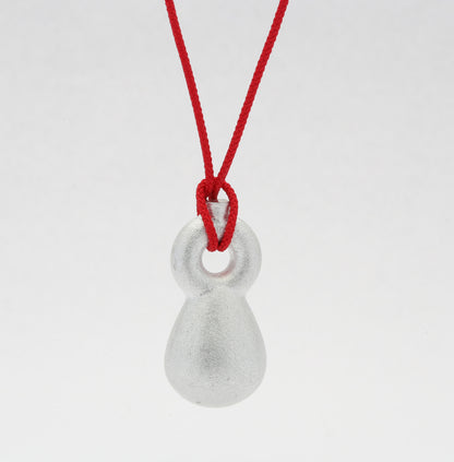 'Crossing Borders' pendants