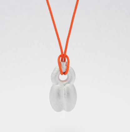 'Crossing Borders' pendants