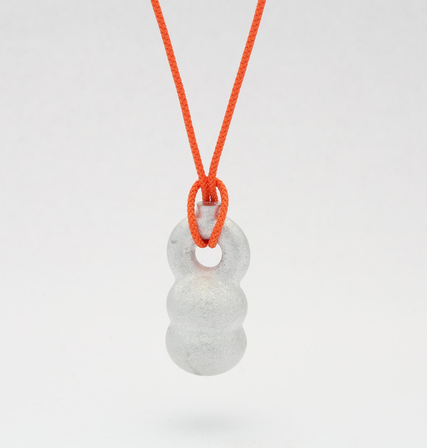 'Crossing Borders' pendants