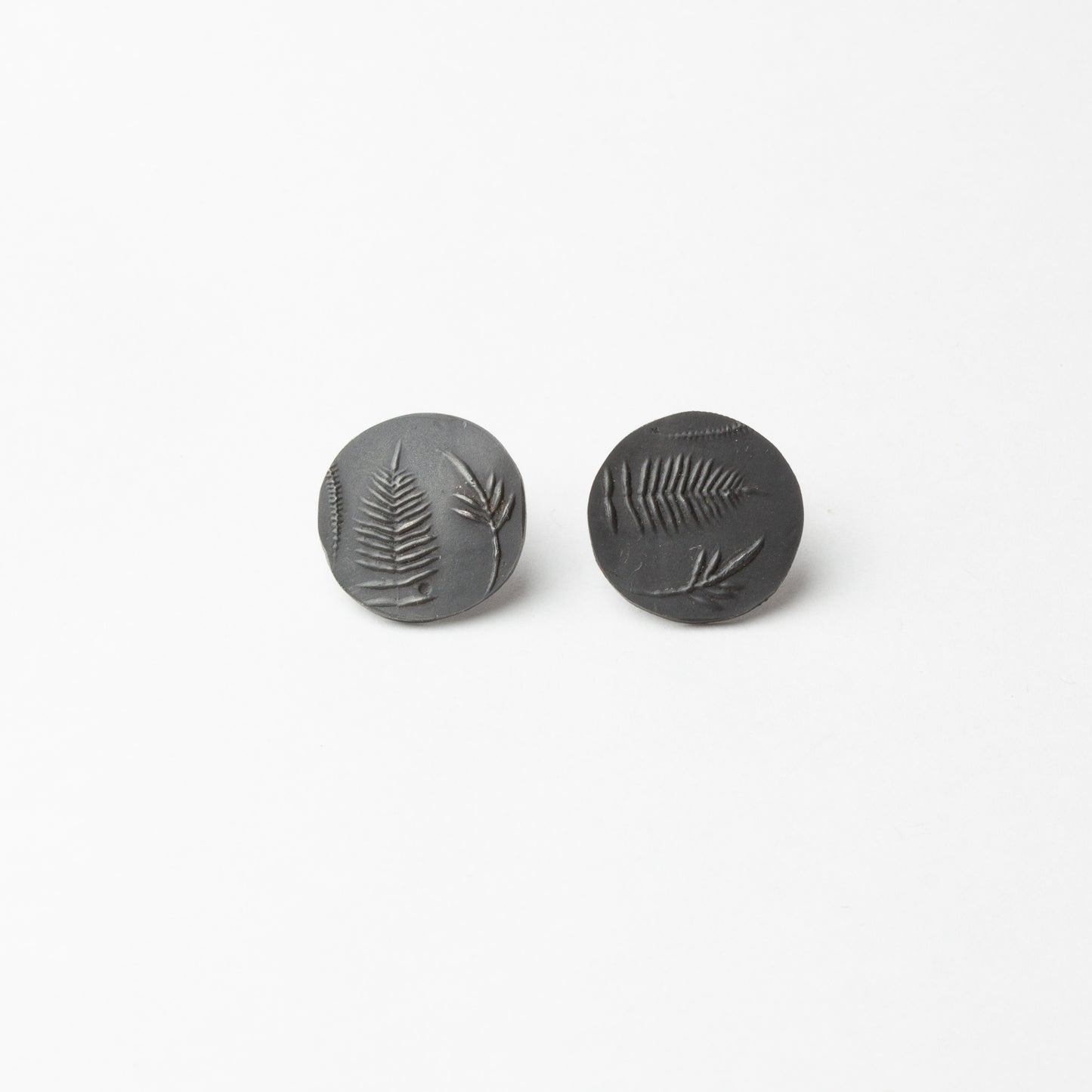 Black fern studs
