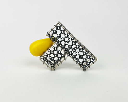 Brooch with yellow bead