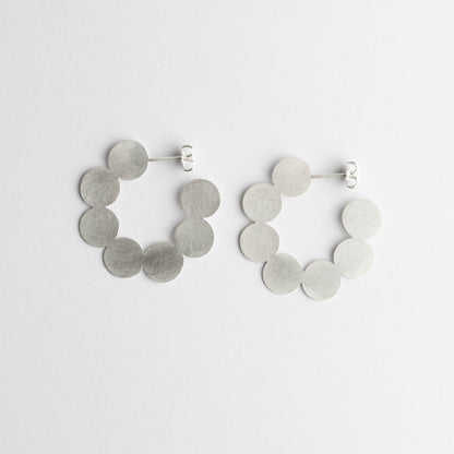 '7 point' earrings