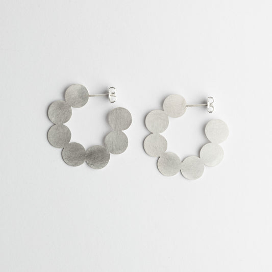 '7 point' earrings