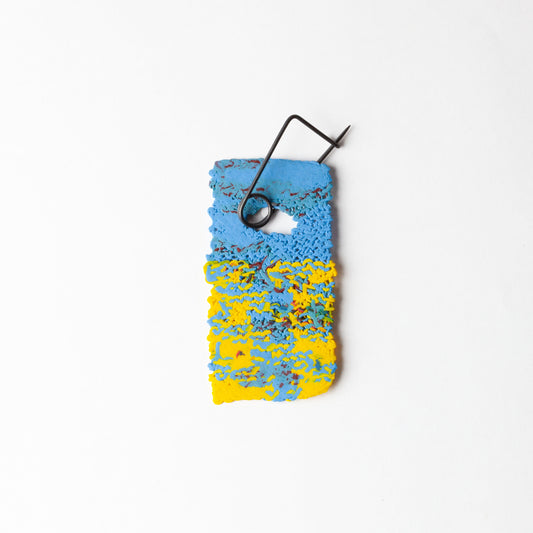 Label brooch #73