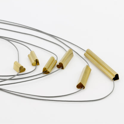 'Centimetre of love' pendants
