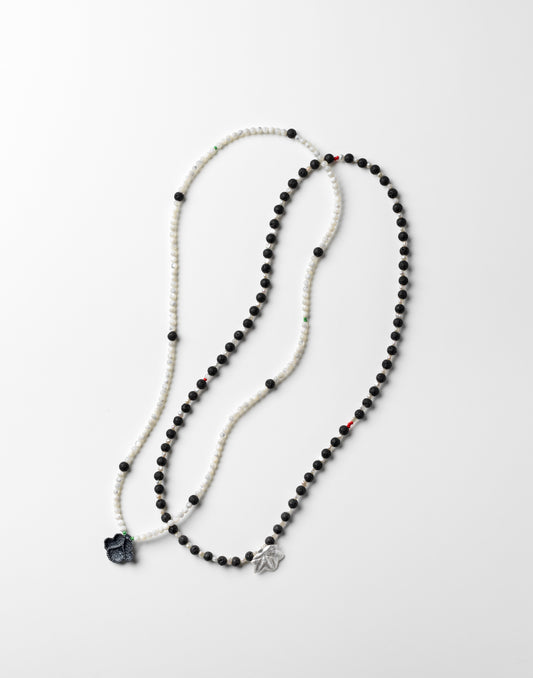 'Cotton Leaf' strand of beads (right)