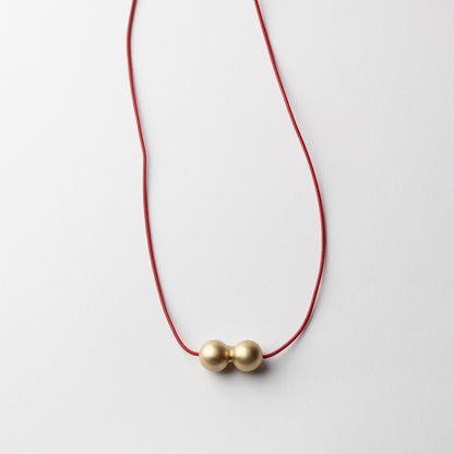 'Ball' pendants - gold