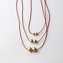 'Ball' pendants - gold