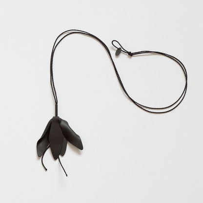 'Offerings: Wilted Champee' pendant (black)