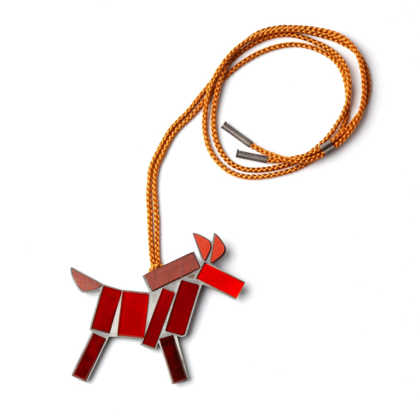 Red dog-shaped pendant on an orange cord against a white background