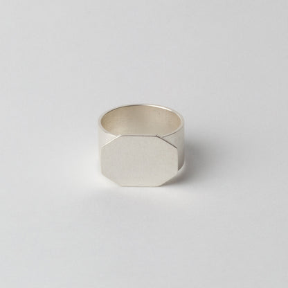 Silver textured ring (faceted front)