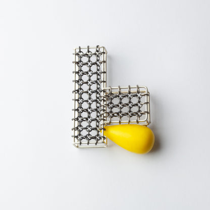 Brooch with yellow bead