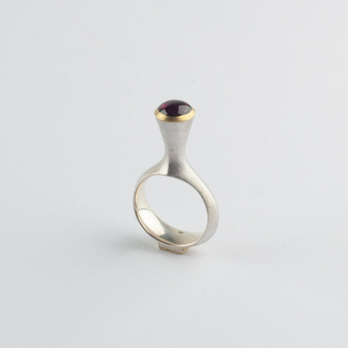 'Tower' ring with garnet
