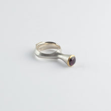 'Tower' ring with garnet