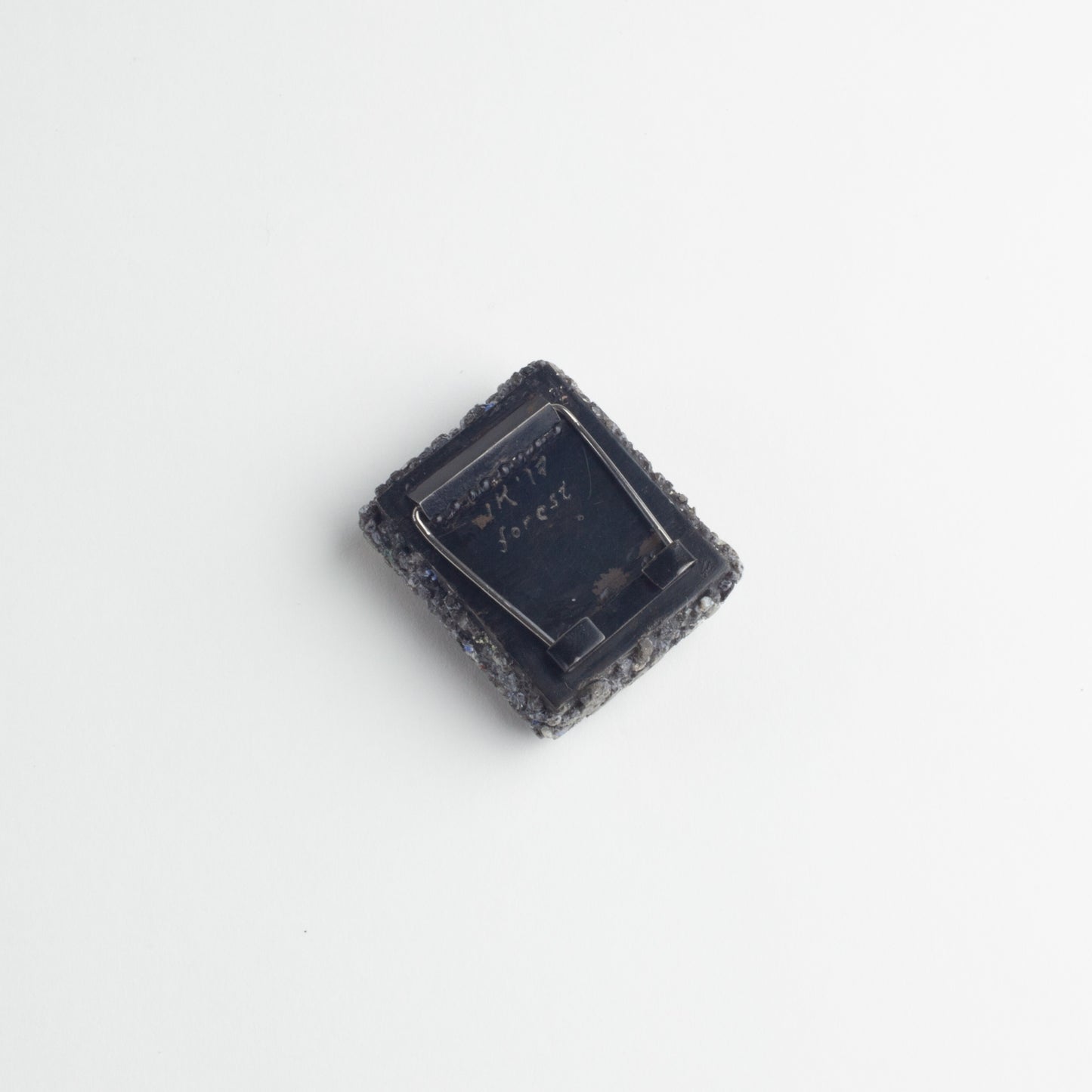 'Shining through' brooch