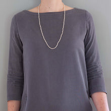 'Faces' necklace