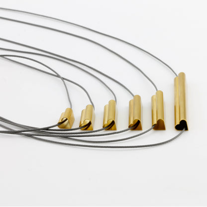 'Centimetre of love' pendants