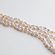 'Faces' necklace