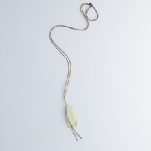 'Offerings: Wilted Champee' pendants - ivory