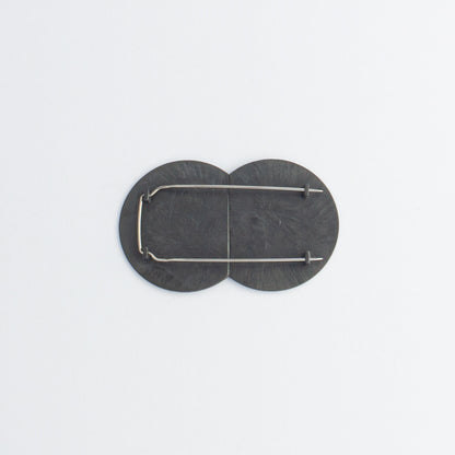 'CUT 21' brooch