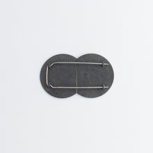 'CUT 21' brooch