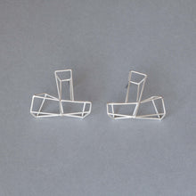Silver frame stud earrings
